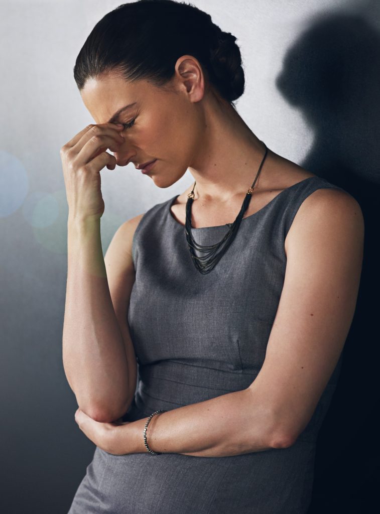 A person looking at a chart, representing depression management.